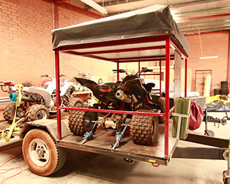 Camper trailer showing quad bike storage
